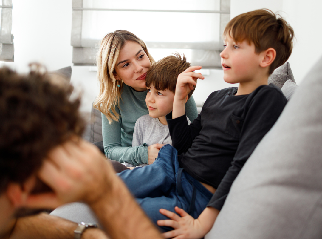 Parent Discussing with Children